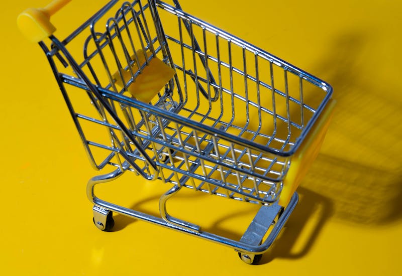 Shopping cart in a grocery store for finding cheap groceries