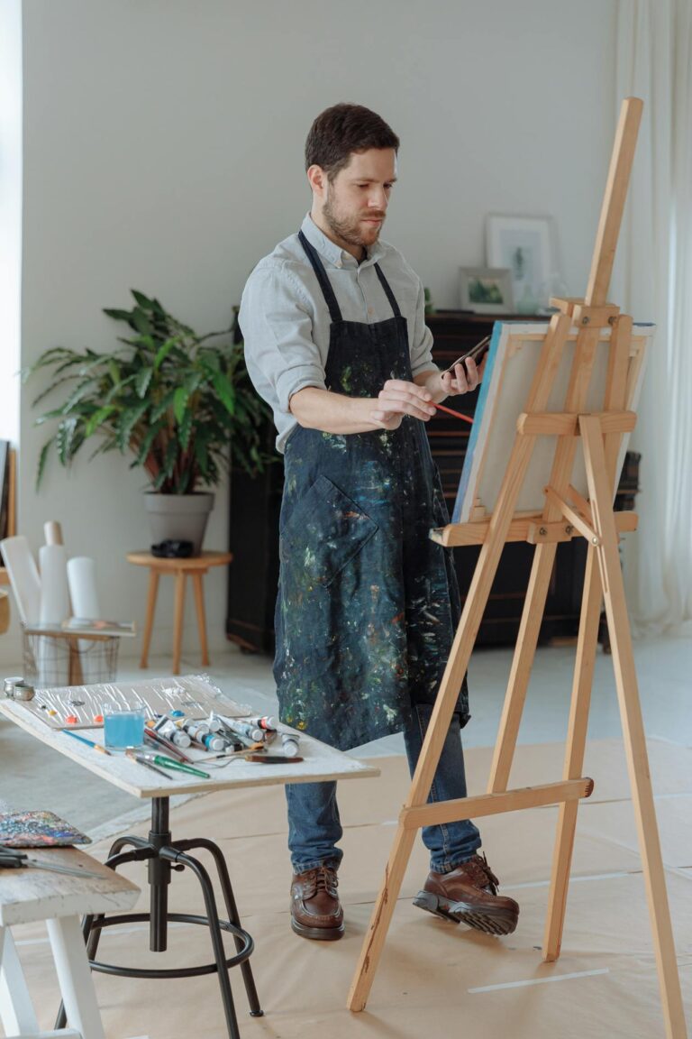 Person enjoying a creative hobby at home