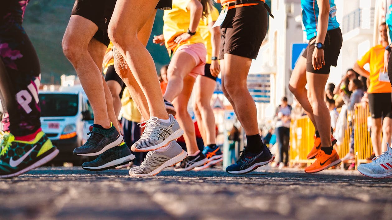 Person running outdoors as a physical hobby
