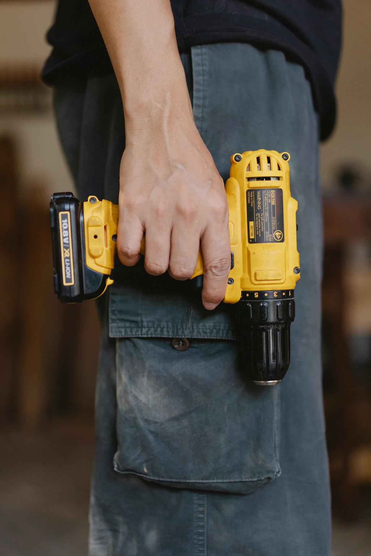 A skilled handyman with professional tools at a job site