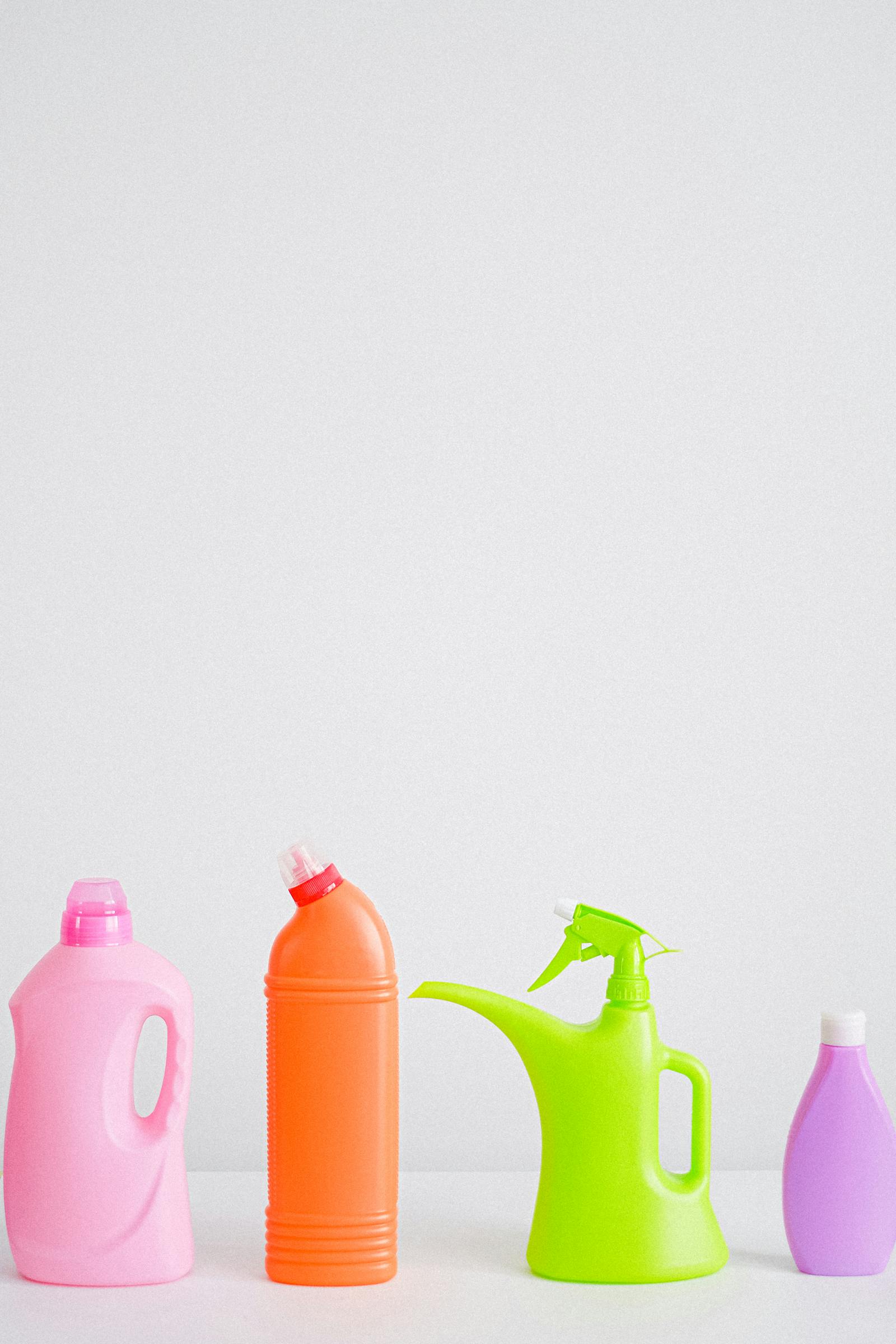 House cleaner wiping down a kitchen counter