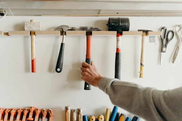 A handyman holding tools, ready to start a home repair job